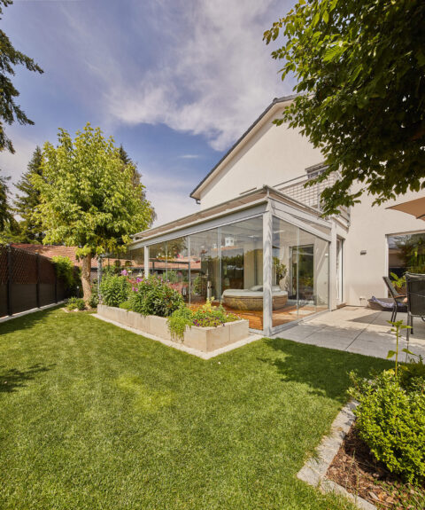 Kaltwintergarten mit Ganzglasschiebeanlage